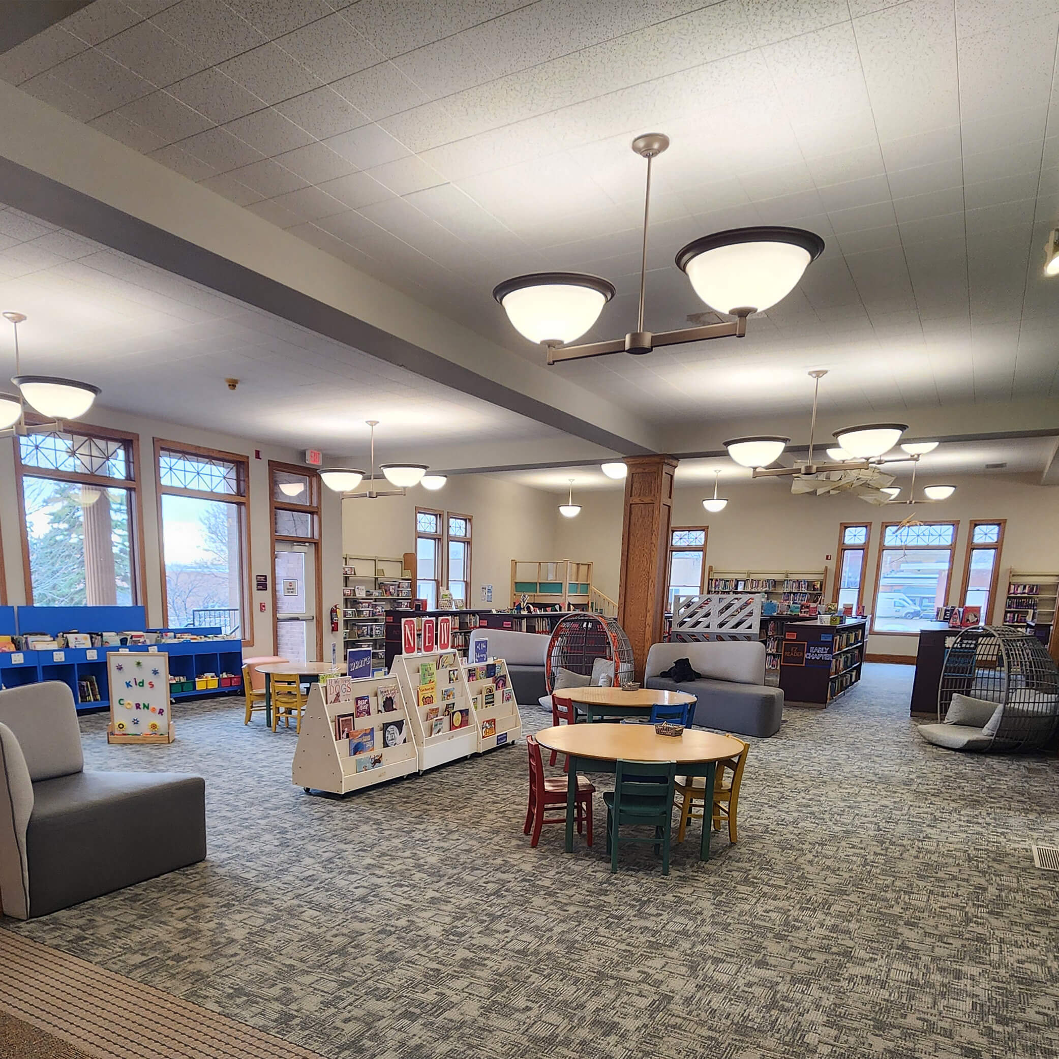 Kids corner with colorful furniture, tables and chairs